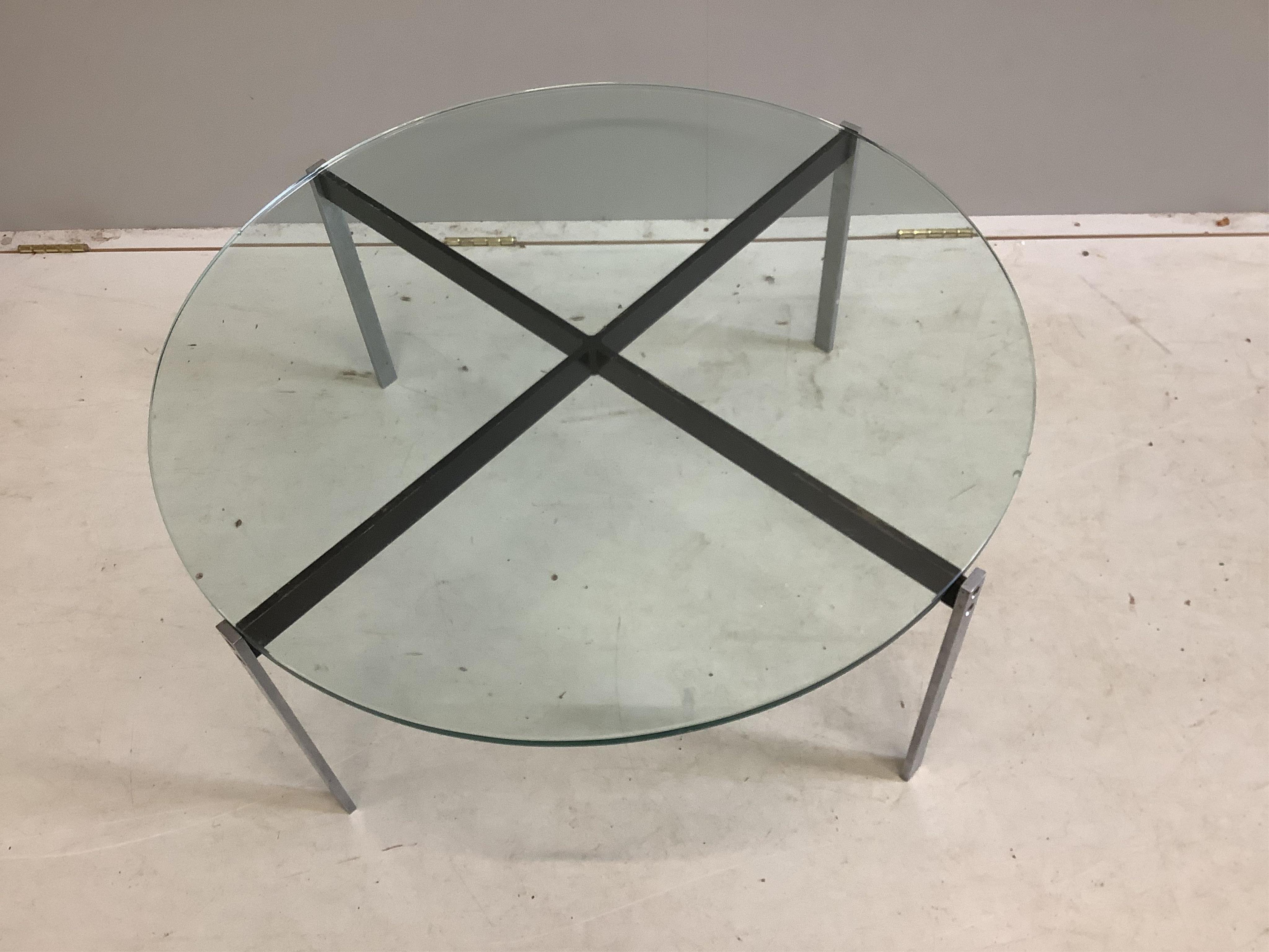 A mid century design circular glass coffee table, diameter 84cm, height 36cm. Condition - fair